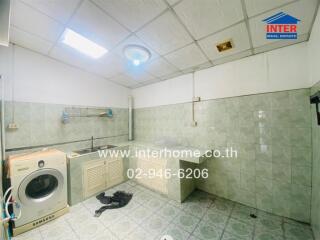 Laundry room with washer and counter space