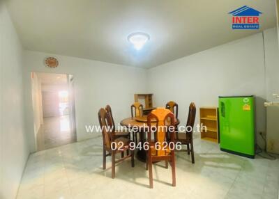 Dining area with table and chairs