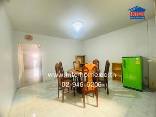 Dining area with table and chairs