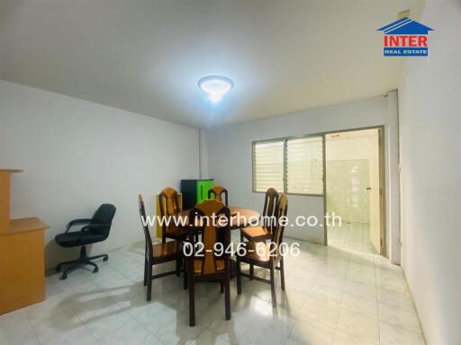 Dining room with table, chairs, and desk