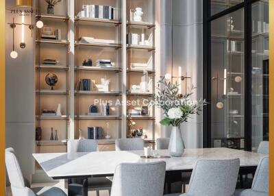Modern dining area with high ceilings and open shelving
