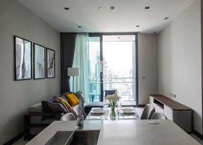 Living room with a modern decor and large windows