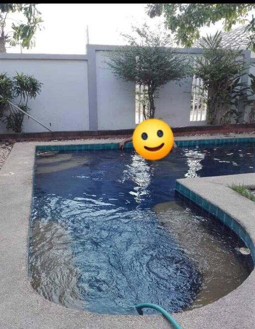 Swimming pool in backyard