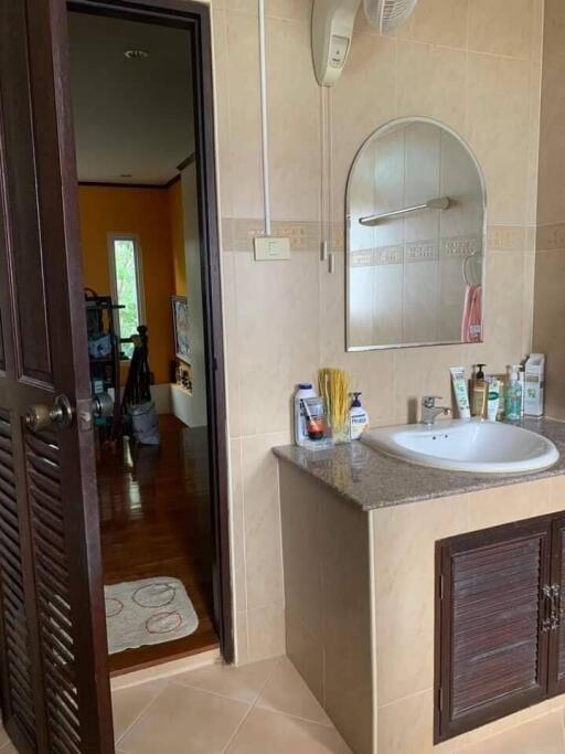 Bathroom with sink and mirror