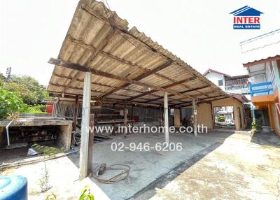 Covered outdoor space with concrete floor