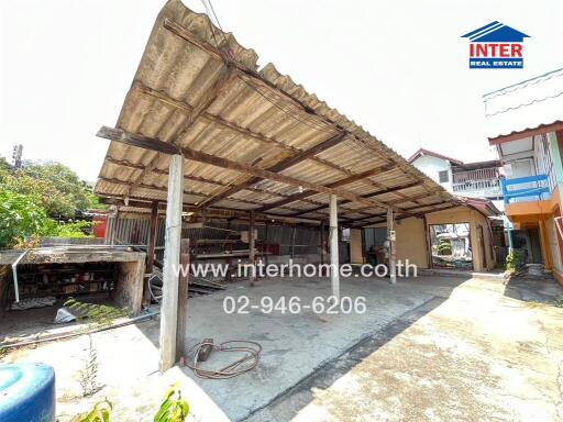 Covered outdoor space with concrete floor