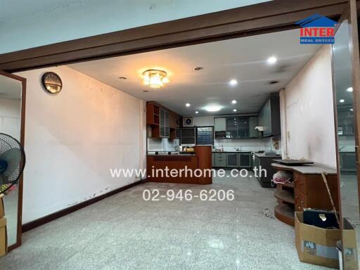 Spacious kitchen area with modern fixtures and ample storage