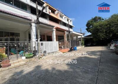 Building facade with driveway