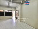 Unfurnished interior space with tiled floor