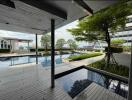outdoor pool area with modern deck and garden