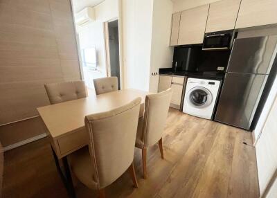 Modern kitchen with dining table and chairs