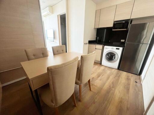 Modern kitchen with dining table and chairs