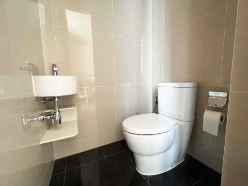 Modern bathroom with toilet and sink