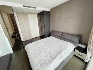 Spacious bedroom with double bed and modern decor