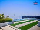 Rooftop garden with greenery and paved walkways