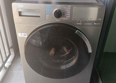 Washing machine in a laundry room