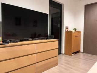 Bedroom with modern furniture and TV