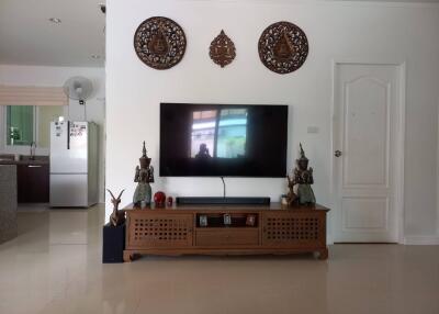 Modern living room with TV and decorative elements