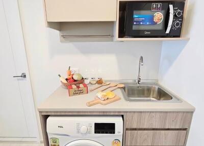 Compact kitchen setup with modern appliances