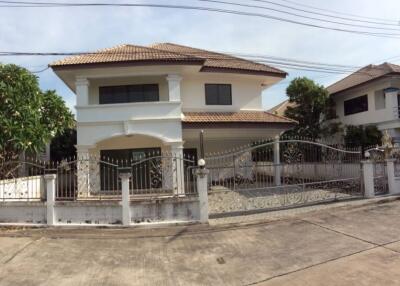 Two-story house with gated entrance