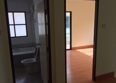 View of a bathroom and adjacent room