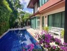 Outdoor patio with pool and garden