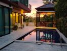 Modern house with pool at sunset