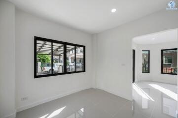 Bright and spacious living room with large windows