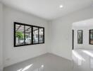 Bright and spacious living room with large windows