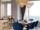 Luxurious dining area with large chandelier and modern decor