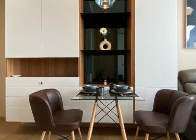 Compact dining area with elegant furnishings and modern decor
