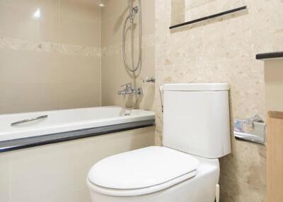 Modern bathroom with bathtub and toilet