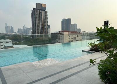 Rooftop infinity pool with city view