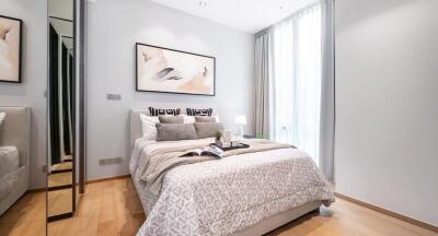 Modern bedroom with a comfortable bed and elegant decor