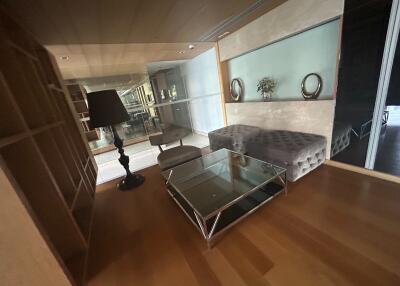 Modern living room with furniture and glass coffee table