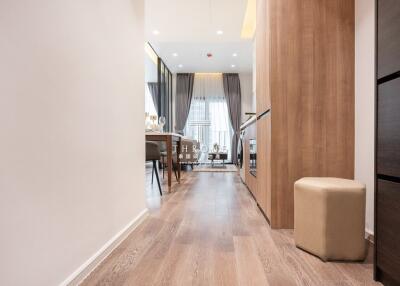 Spacious and modern hallway with wooden flooring