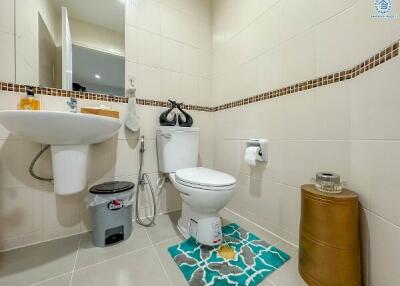 Modern bathroom with toilet and sink