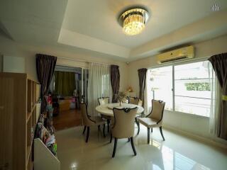 Modern dining room with elegant chandelier