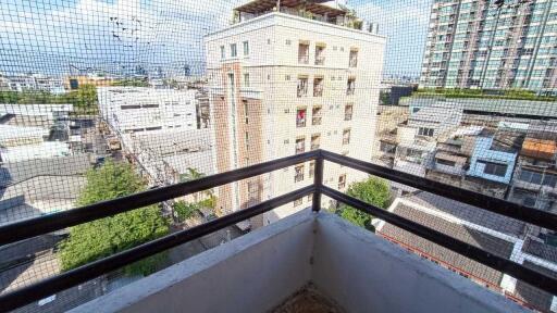 Balcony with a view of the surrounding buildings