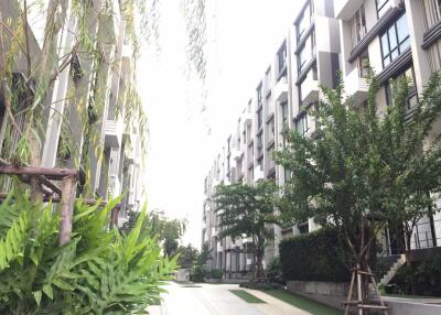 Modern apartment buildings with landscaped surroundings