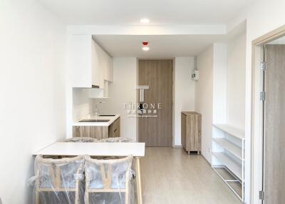 modern minimalist kitchen area with dining table