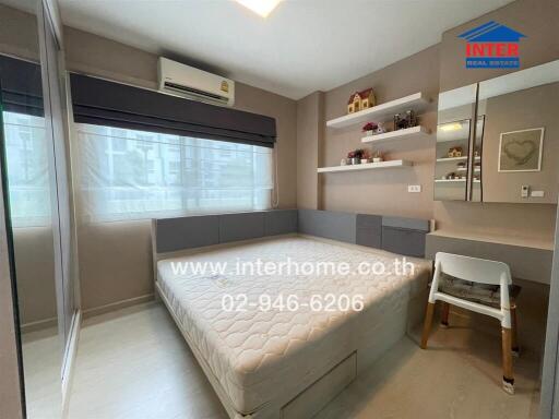 Modern bedroom with built-in furniture and large window