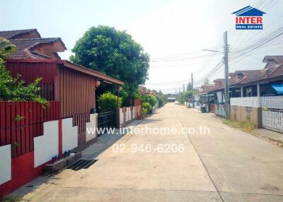 Neighborhood street view with houses and greenery