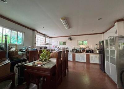 Large kitchen with dining area and modern appliances