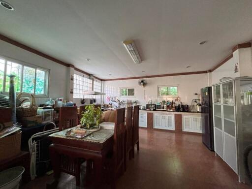 Large kitchen with dining area and modern appliances