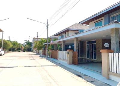 Exterior view of residential buildings along a suburban street