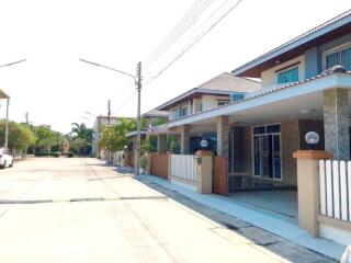 Exterior view of residential buildings along a suburban street