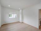 Spacious unfurnished bedroom with large windows