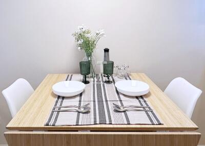 Minimalist dining table setup with two chairs