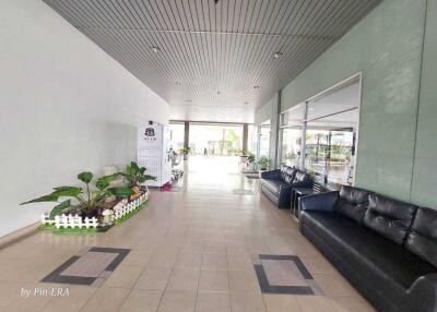 Spacious and well-lit lobby with seating area